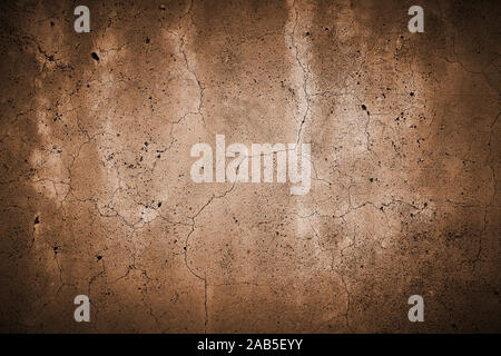 cracked concrete wall with fine fissures background texture, colored copper Stock Photo
