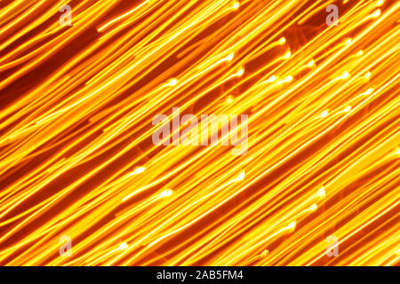 Futuristic blurred lights holiday monochrome background in yellow. Horizontal, soft focus Stock Photo