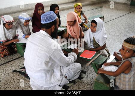 Children at an Islamic educational school, known as madrasa in Dhaka ...