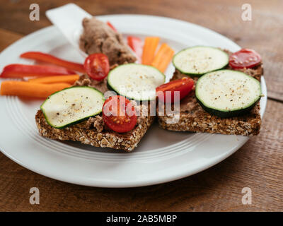 Bread with home made lentil, walnut pate spread. Stock Photo