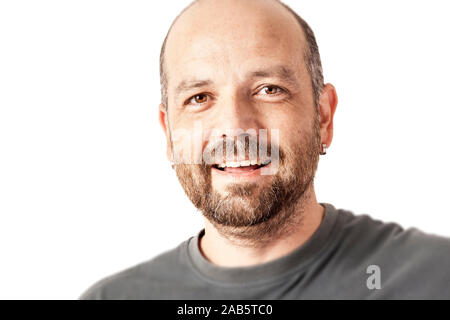 Ein sympathischer Mann mit Bart vor weissem Hintergrund Stock Photo