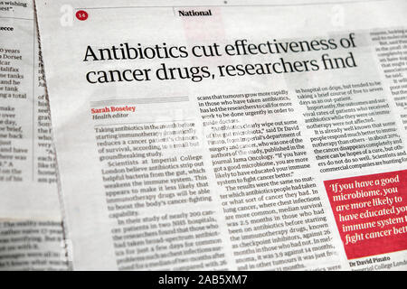 'Antibiotics cut effectiveness of cancer drugs, researchers find'  Guardian newspaper article headline 13 September 2019 London England UK Stock Photo