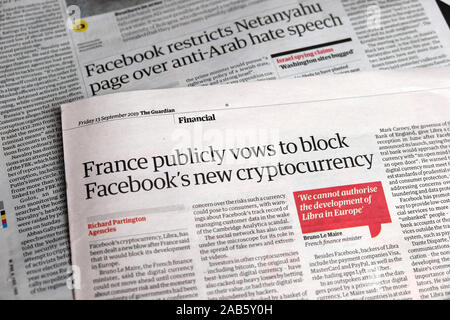 'France publicly vows to block Facebook's new cryptocurrency' Guardian newspaper headline inside page 13 September 2019 London England UK Stock Photo