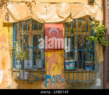 Istanbul, Turkey - September 2019. Windows in a old residential building in the Balat district of Istanbul Stock Photo