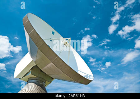 A photography of a sattelite dish and white cloud Stock Photo