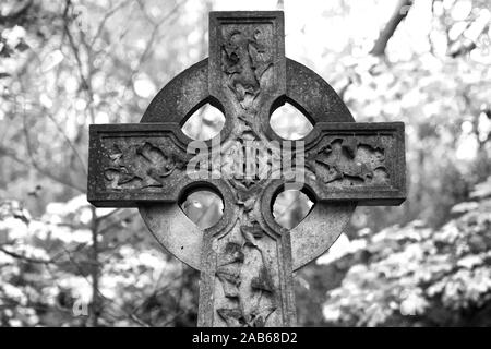 Celtic stone cross in a cemetery Stock Photo
