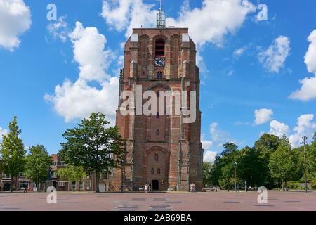 View on De Oldehove. An unfinished and leaning church tower in the medieval centre of the Dutch city of Leeuwarden. Stock Photo