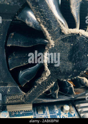 Dust in computer case. Big part of dirty dust on the computer pc processor cooler with mainboard. Stock Photo