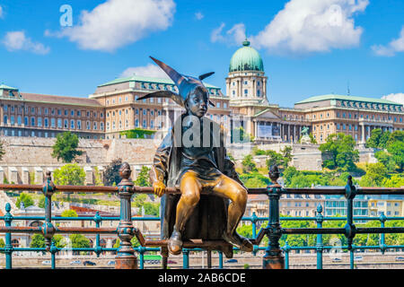 The Little Princess (Kiskirálylány) statue on the Danube promenade in Budapest, Hungary. It was created by sculptor László Marton in 1972. Stock Photo
