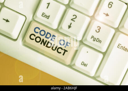 Writing note showing Code Of Conduct. Business concept for Ethics rules moral codes ethical principles values respect Stock Photo