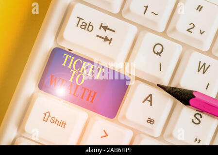 Handwriting text writing Ticket To Wealth. Conceptual photo Wheel of fortune Passage to Successful and brighter future White pc keyboard with empty no Stock Photo