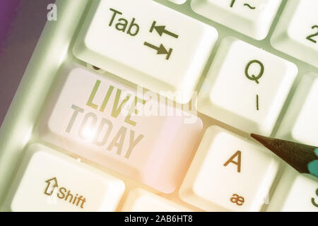 Text sign showing Live Today. Business photo showcasing spend your life doing what you want Live in the present moment Stock Photo