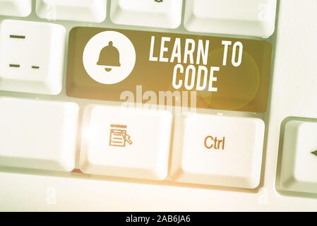 Handwriting text Learn To Code. Conceptual photo Learn to write Software Be a Computer Programmer Coder Stock Photo