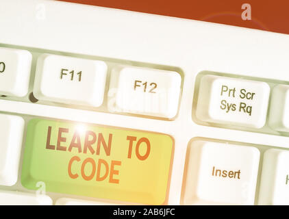 Handwriting text writing Learn To Code. Conceptual photo Learn to write Software Be a Computer Programmer Coder Stock Photo