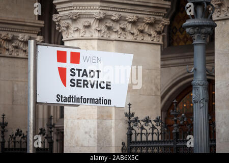 VIENNA, AUSTRIA - NOVEMBER 6, 2019: Logo of Stadtinformation stadtservice wien in front of the city hall of Vienna. Stadtservice is the city administr Stock Photo