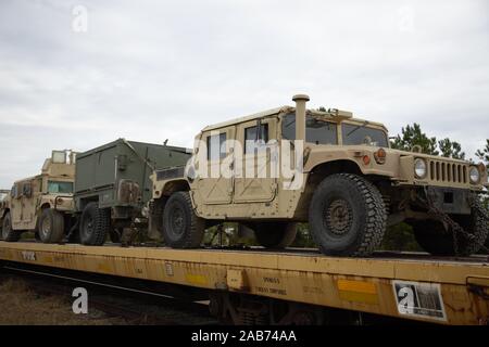 U.S. Marine Corps vehicles from II Marine Expeditionary Force arrive on rail carts during rail transportation operations headed by Marines of 2nd Transportation Support Battalion, Combat Logistics Regiment 2, 2nd Marine Logistics Group at Marine Corps Base Camp Lejeune on Nov. 22, 2019. The Marine vehicles loaded by 2nd TSB were used in MAGTF Warfighting Exercise 1-20. (U.S. Marine Corps photo by Cpl. Dominique Osthoff) Stock Photo