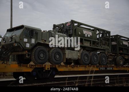 U.S. Marine Corps vehicles from II Marine Expeditionary Force arrive on rail carts during rail transportation operations headed by Marines of 2nd Transportation Support Battalion, Combat Logistics Regiment 2, 2nd Marine Logistics Group at Marine Corps Base Camp Lejeune on Nov. 22, 2019. The Marine vehicles loaded by 2nd TSB were used in MAGTF Warfighting Exercise 1-20. (U.S. Marine Corps photo by Cpl. Dominique Osthoff) Stock Photo