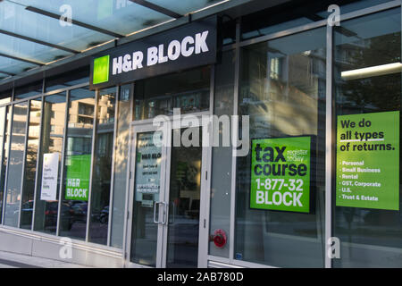 Vancouver, Canada - October 5, 2019: Street View of entrance H&R Block - tax preparation company in Downtown Vancouver Stock Photo