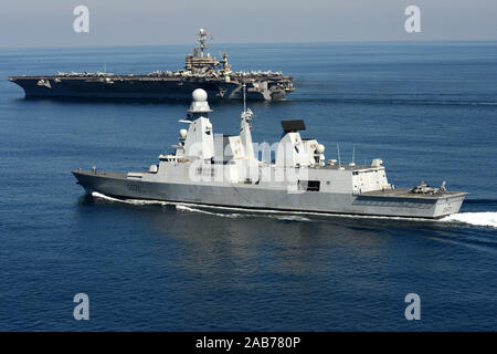 (Feb. 9, 2013) The aircraft carrier USS John C. Stennis (CVN 74) and the French destroyer FS Chevalier Paul (D621) underway. Stock Photo