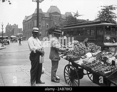 Street vendor selling fruit on a Washington D.C. street ca. 1921-1923 Stock Photo