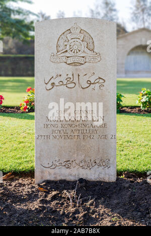 Cairo, Egypt - December 7, 2016: Tombstone of Muslim Singaporean soldier at Heliopolis Commonwealth Second World War Cemetery Stock Photo