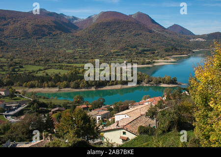 View of Barrea Lake, surrounded by the uncontaminated tops of the Apennines. Three adorable villages are reflected in its water: Barrea, Villetta Barr Stock Photo