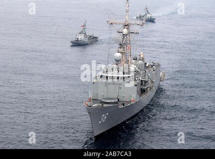 (June 6, 2012) The Oliver Hazard Perry-class guide-missile frigate USS Underwood (FFG 36) is underway with the Chilean navy Riquecue-class fast attack craft Uribe (LM 39) and Serrano (LM 38) during a tactical maneuver exercise. Underwood is deployed to Central and South America in support of Southern Seas 2012. Stock Photo