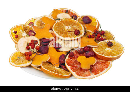 Christmas objects  made of dry red grapefruit  orange  apple fruits slices and red berries. Isolated on white studio macro, natural colors, simplistic Stock Photo