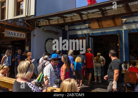 2016, February 14 - Queenstown, New Zealand, People in a queue waiting for the Fergburger the most popular restaurant in Queenstown Stock Photo