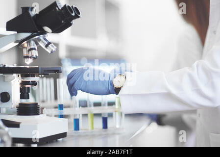 Experiments in the chemical laboratory. An experiment was carried out in a laboratory in transparent flasks Stock Photo