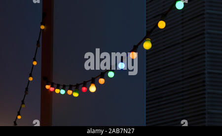 Colorful light bulbs on the string Stock Photo
