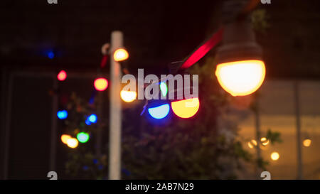 Colorful light bulbs on the string Stock Photo