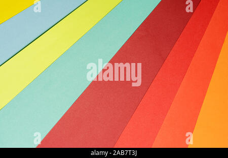 Abstract different pastel colored paper backgrounds with place for text. Diagonal geometric composition. Top view or flat lay. Stock Photo