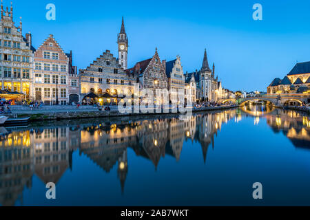 Graslei Quay in the historic city center of Ghent, mirrored in the River Lys during blue hour, Ghent, Belgium, Europe Stock Photo