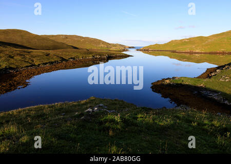 Mavis Grind, early morning reflections, narrow isthmus between North Sea and Atlantic Ocean, Shetland Isles, Scotland, United Kingdom, Europe, Europe Stock Photo