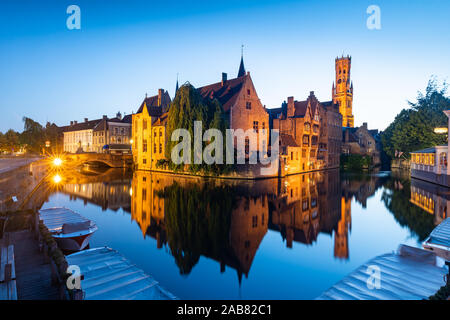 The beautiful buildings of Bruges reflected in the still waters of the canal, UNESCO World Heritage Site, Bruges, Belgium, Europe Stock Photo