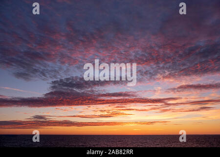 Sun setting over Baltic Sea, Atlantic Ocean, Russia, Europe Stock Photo