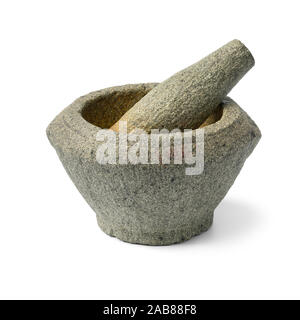 Old used stone Asian mortar and pestle isolated on white background Stock Photo