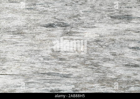 Gray rough desk. Abstract plywood background. Antique flooring, timber texture. Grunge wooden wall. Stock Photo