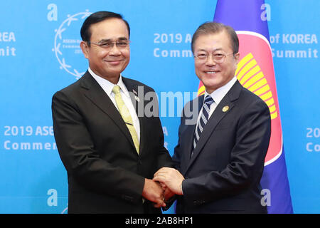 Busan, South Korea. 26th nov 2019. (191126) -- BUSAN, Nov. 26, 2019 (Xinhua) -- South Korean President Moon Jae-in (R) and Thai Prime Minister Prayut Chan-o-cha hold a joint press conference after the 2019 ASEAN-ROK Commemorative Summit in Busan, South Korea, Nov. 26, 2019. The 10 member countries of the Association of Southeast Asian Nations (ASEAN) and South Korea agreed on Tuesday to resist all forms of protectionism and enhance trade for regional prosperity. Credit: Xinhua/Alamy Live News Stock Photo