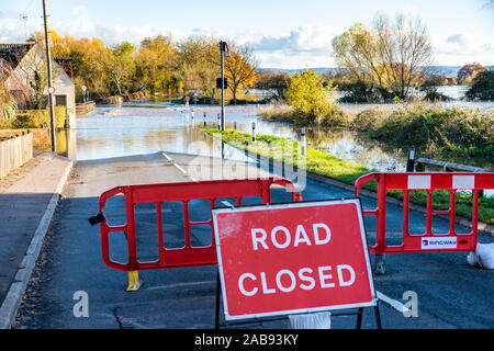 Floodwater from the River Severn closing B4213 on the approach to Haw Bridge in the Severn Vale village of Tirley, Gloucestershire UK on 18/11/2019 Stock Photo