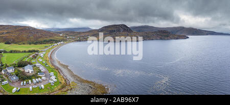 Wide panoramic drone shoot over popular campsite in Ardmair in the North West Coast of Scotland - NC500 Route Stock Photo