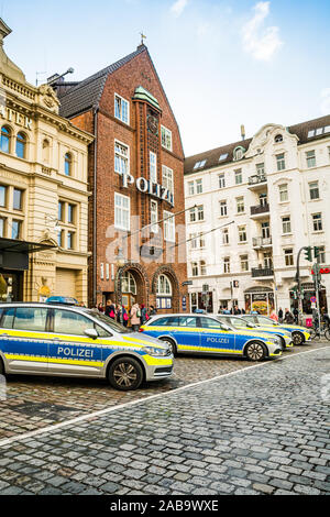 Hamburg, Germany - November 09, 2019. Police station in Sankt Pauli quarter with police cars in front of the building Stock Photo