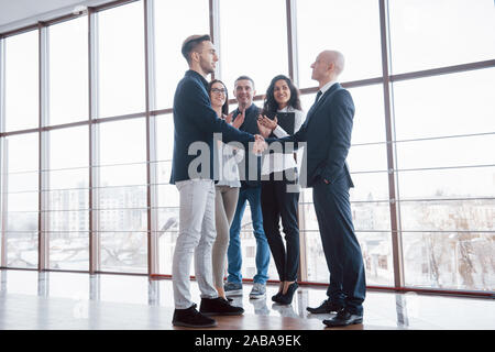 Two confident business man shaking hands during a meeting in the office, greeting and partner concept Stock Photo