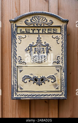 old beautifully decorated post box with the inscription in french language lettres in english letters Stock Photo