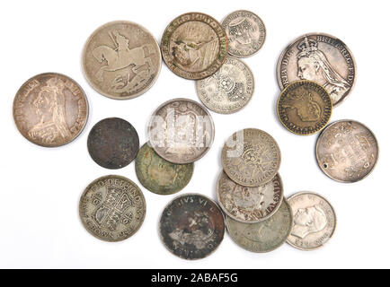 Old, tarnished, mostly British coins Stock Photo
