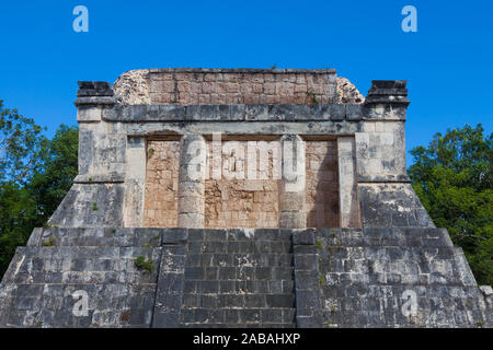 Temple of the Bearded Man overlooking the Pelota ball court of Chichen Itza in Mexico Stock Photo