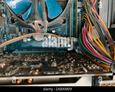 Dust in computer case. Big part of dirty dust on the computer pc processor cooler with mainboard. Stock Photo