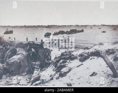 Cyril Ager from the Royal Engineers, clearing mines driving a Bull-dozer  landing on 'Gold Beach' D-Day plus thirty minutes . June 6th 1944 Stock Photo