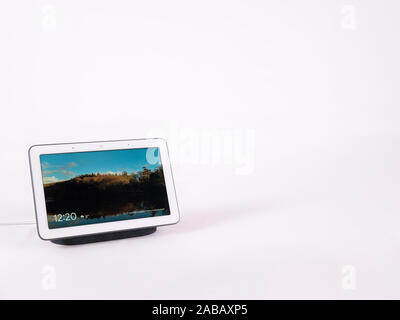 Touch screen smart home voice assistant speaker on white with room for text Stock Photo